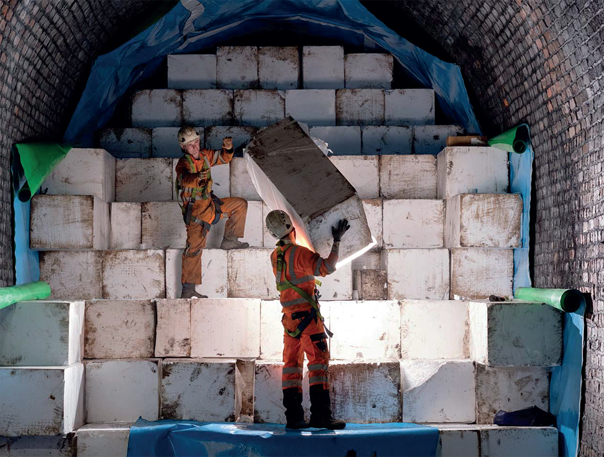 St Margaret's Head Railway Tunnel - Installation of expanded polystyrene (EPS) blocks in staggered, interlocking layers